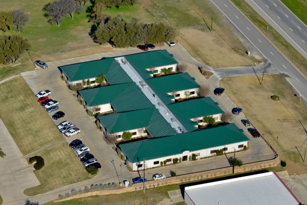 Green Commercial Roofing in Dallas–Fort Worth | WaterTight Roofing WaterTight Roofing team installing an eco-friendly green commercial roof on a building in the Dallas–Fort Worth area, improving energy efficiency and environmental sustainability. Call 888-809-9976 today to discover how WaterTight Roofing can help your business go green with durable, energy-saving roofing solutions designed for long-term performance.
