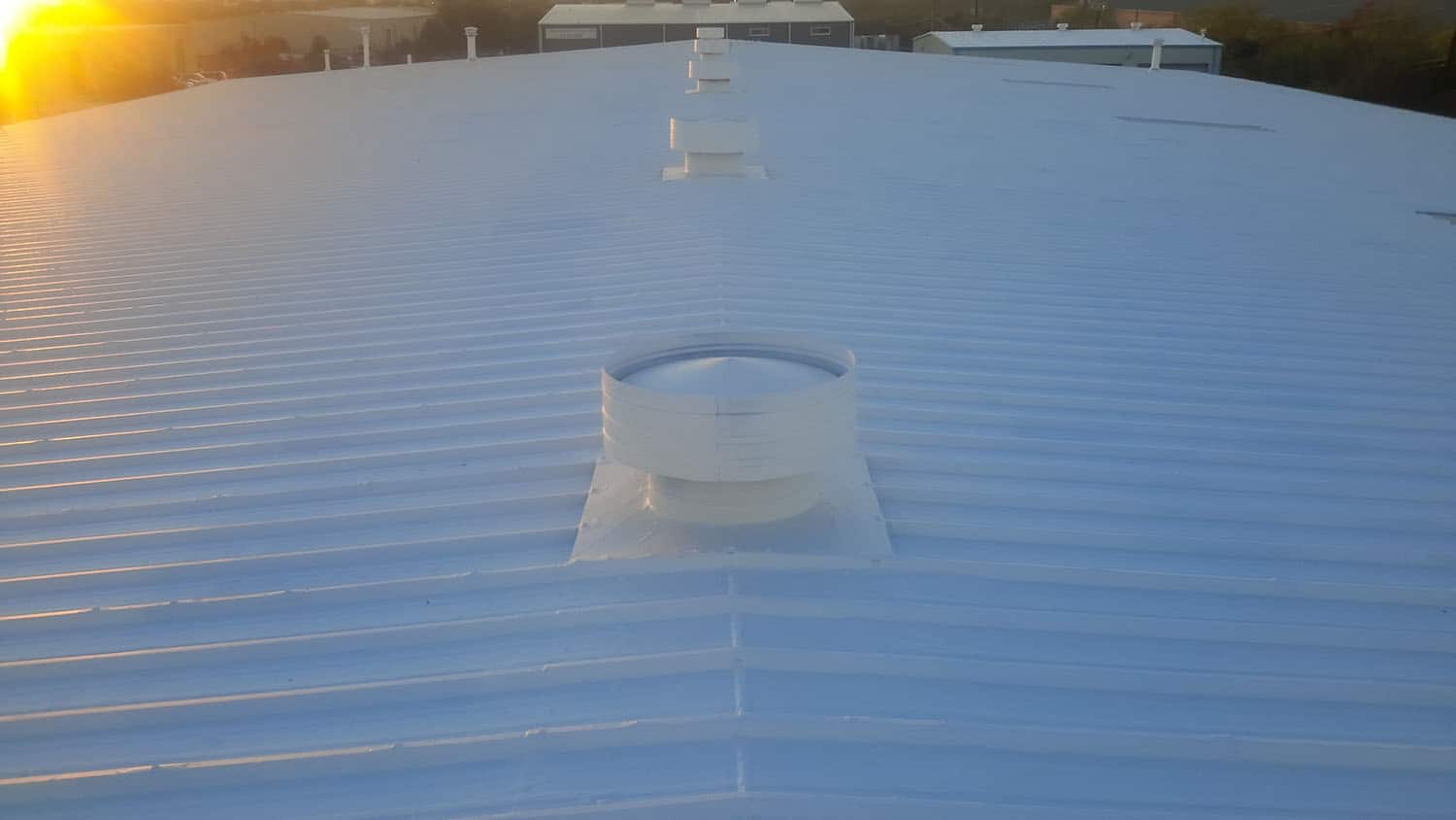 Elastomeric Roof Coating Solutions | WaterTight Roofing Roof Restoration