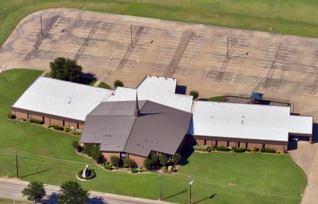 WaterTight Roofing specialists repairing the roof of a religious institution with care and precision to preserve the structure and ensure long-term protection. Call 888-809-9976 today to work with a trusted partner that understands the unique roofing needs of churches and nonprofit facilities. WaterTight Roofing—committed to craftsmanship, community, and lasting relationships.